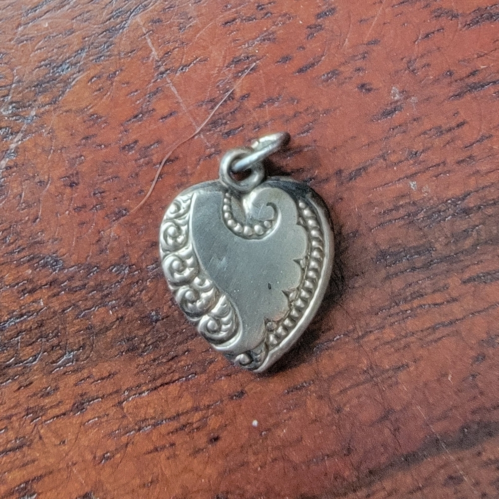 Vintage Repousse Sterling Heart Charm